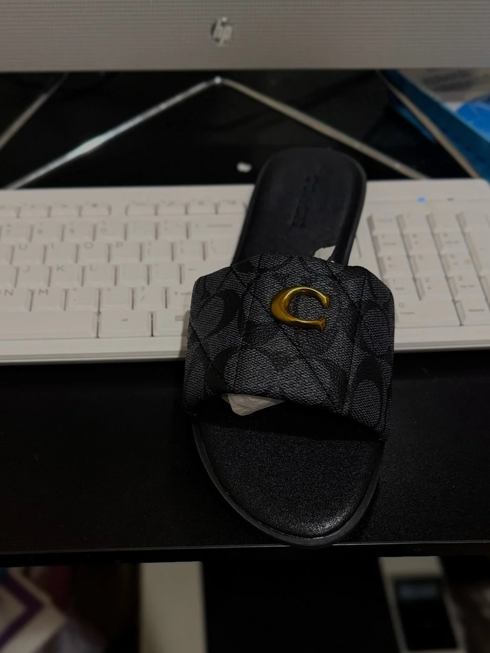 Coach Black Slide sandals with Gold “C”